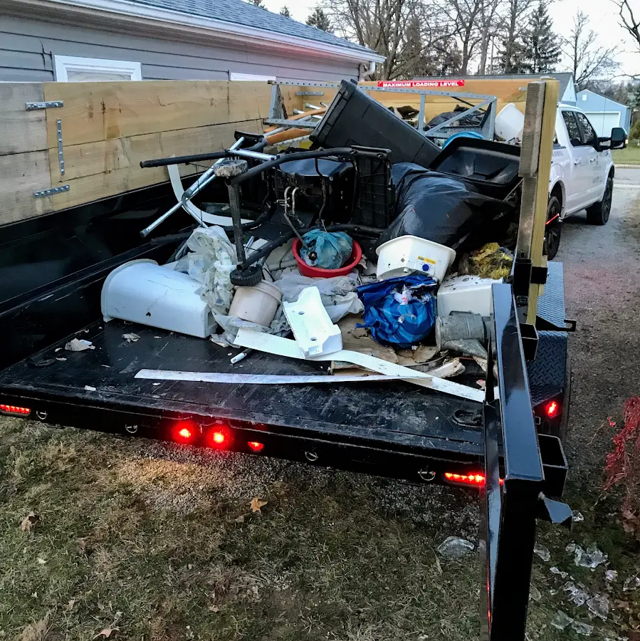 Roll-off dumpster delivered to a residential driveway in Lindon